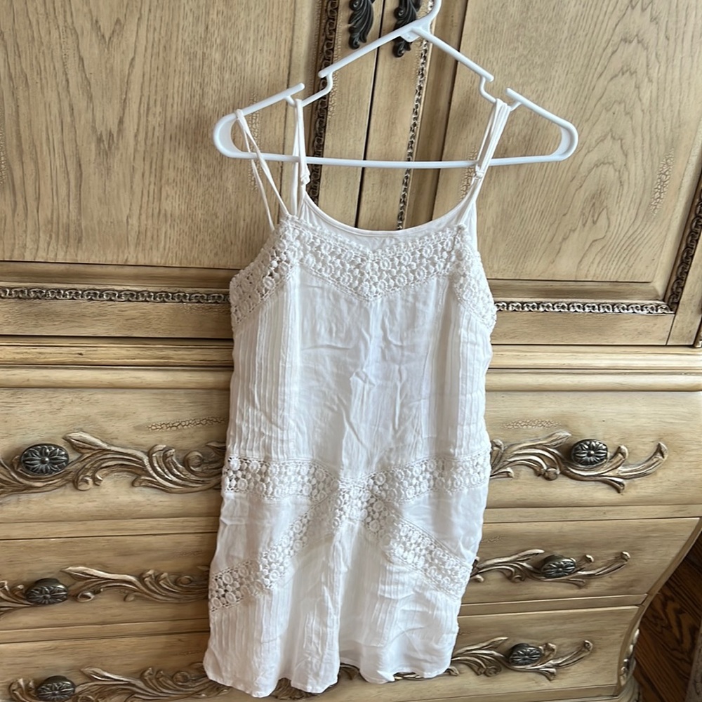 White mini dress with crochet detailing